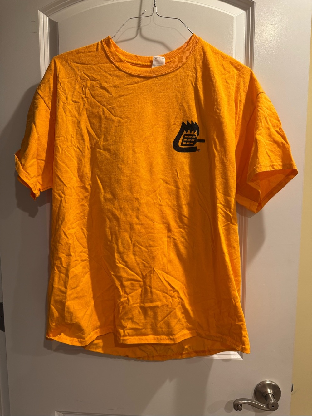 Gildan Short-Sleeve Tee from Cookout in Bright Orange with Black Chest Emblem